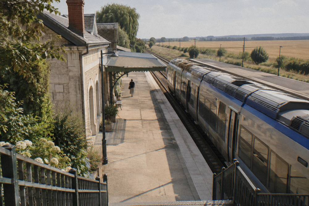 Railway platform at Vernon-Giverny station with a regional train at rest