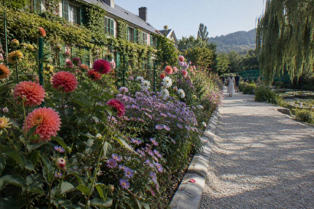 Flower border and garden path in the Clos Normand at Giverny